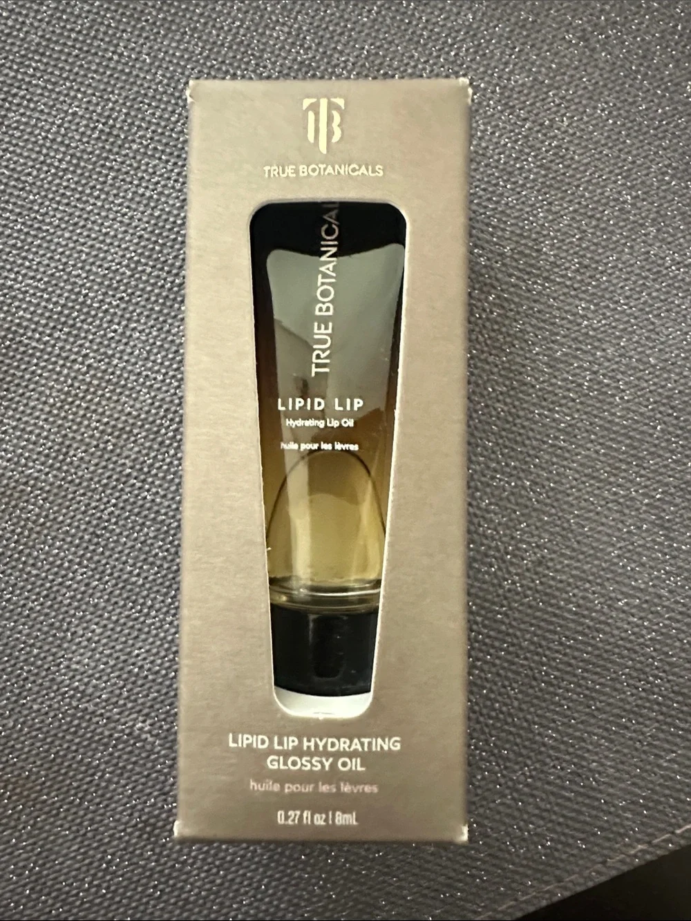 True Botanicals Lipid Lip Hydrating Glossy Oil — Clear/Gold
